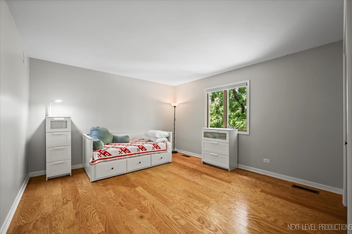 92 Red Fox Run Montgomery, IL 60538 - Photo 20 of 25 a bedroom with a bed and a window