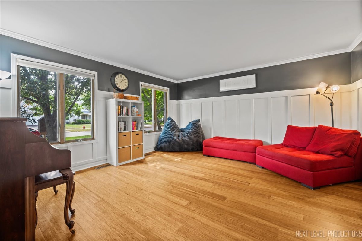 92 Red Fox Run Montgomery, IL 60538 - Photo 4 of 25 a bed room with a bed and a chair