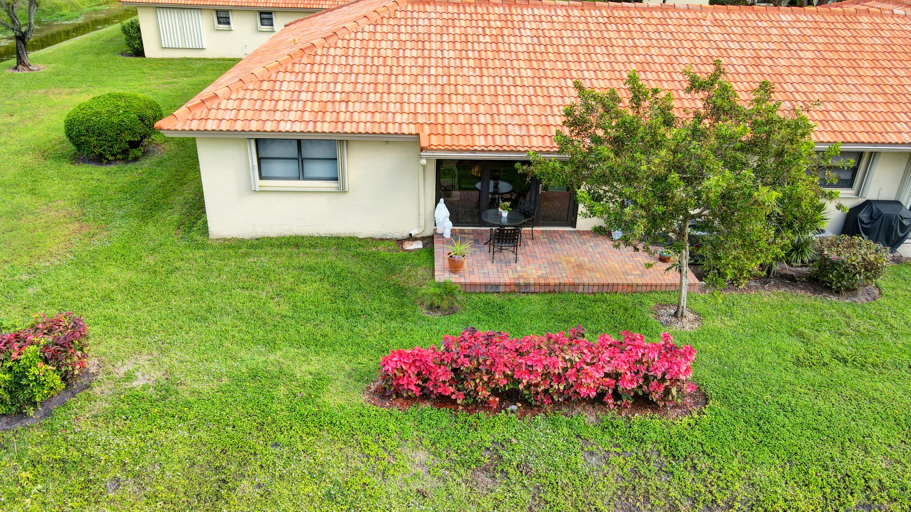 4645 Laurel Tree Road, Unit B Boynton Beach, FL 33436 - Photo 15 of 18 4645 LAUREL TREE RD AERIAL BCK YD