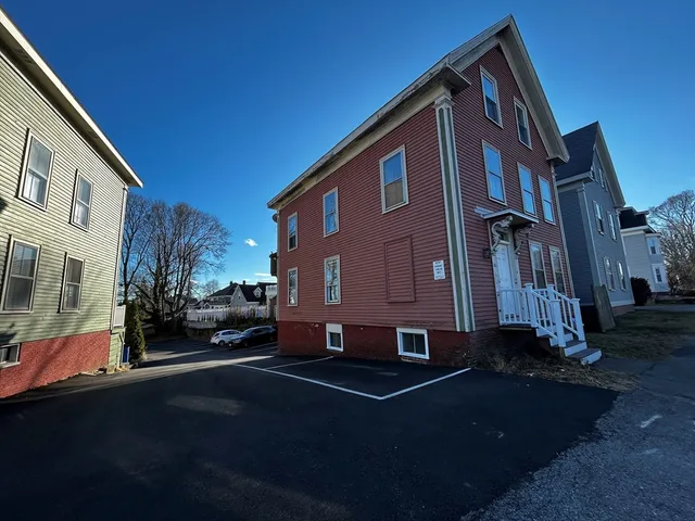 a view of yard with car parked