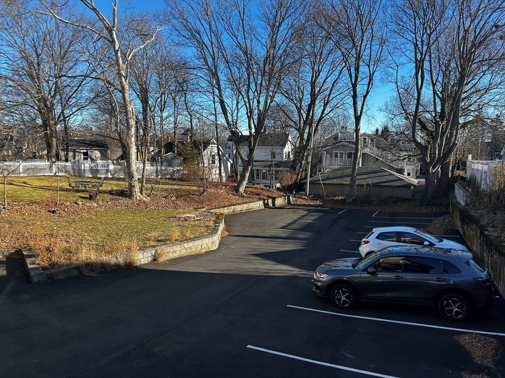 53 Hale Street, Unit 3 Beverly, MA 01915 - Photo 4 of 14 a view of yard with car parked