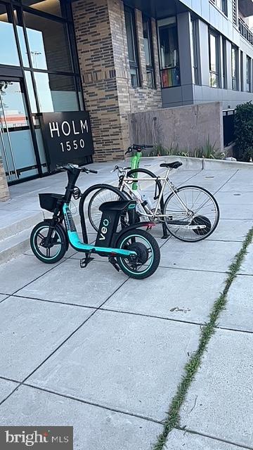 a view of a patio with table and chairs