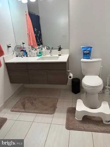 a bathroom with a sink and a toilet