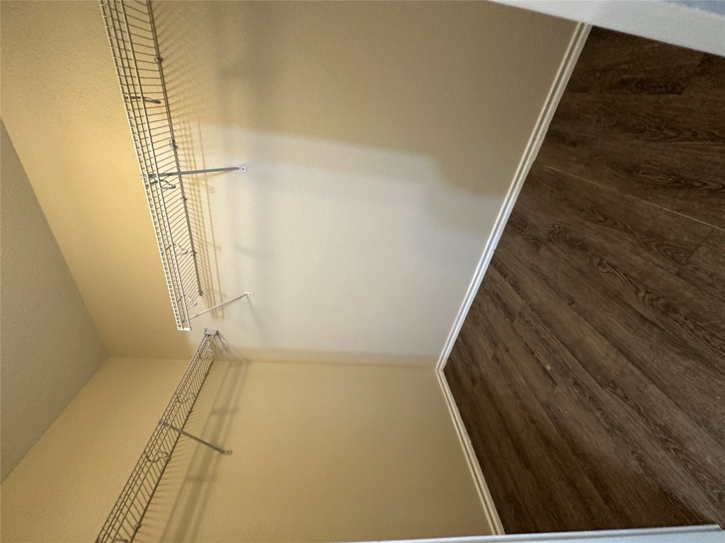 3416 Autumn Bay Drive Austin, TX 78744 - Photo 11 of 14 a view of a room with racks on the wall