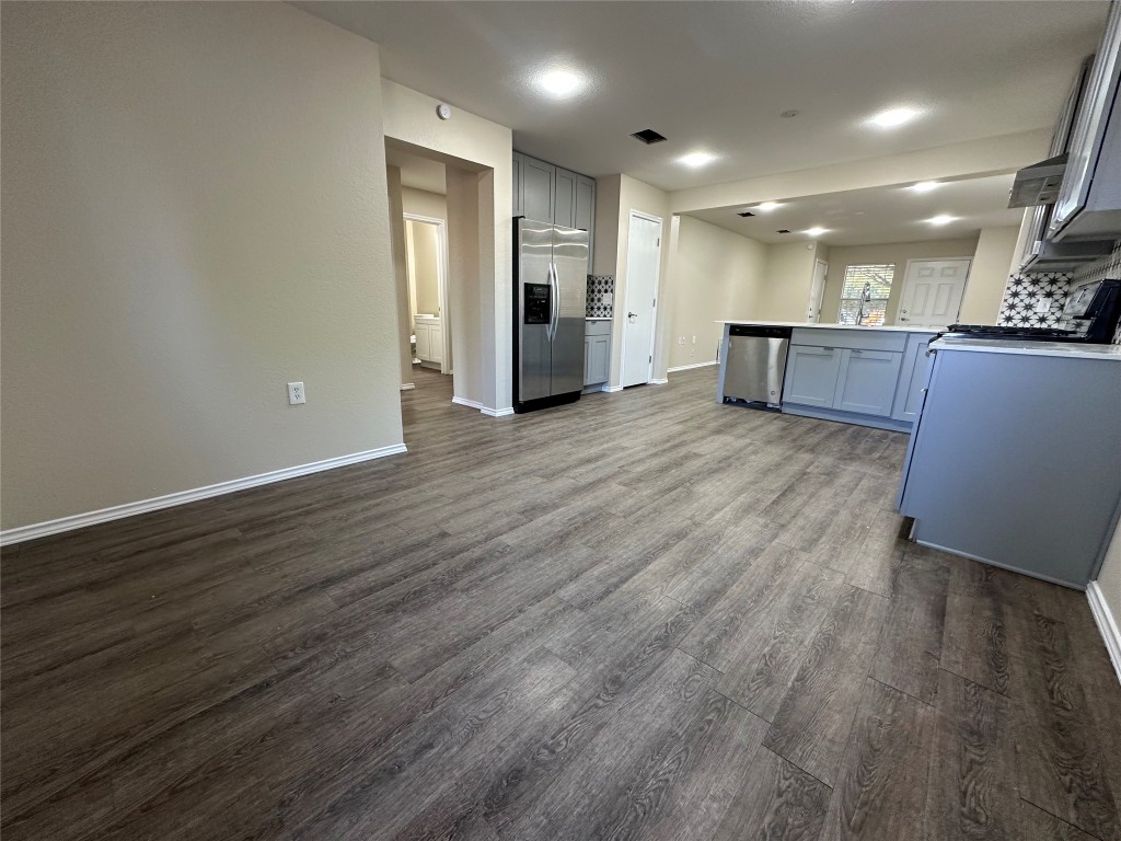 3416 Autumn Bay Drive Austin, TX 78744 - Photo 14 of 14 a view of kitchen with wooden floor