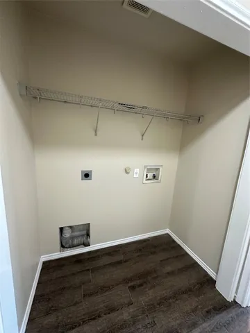 a view of kitchen with wooden floor