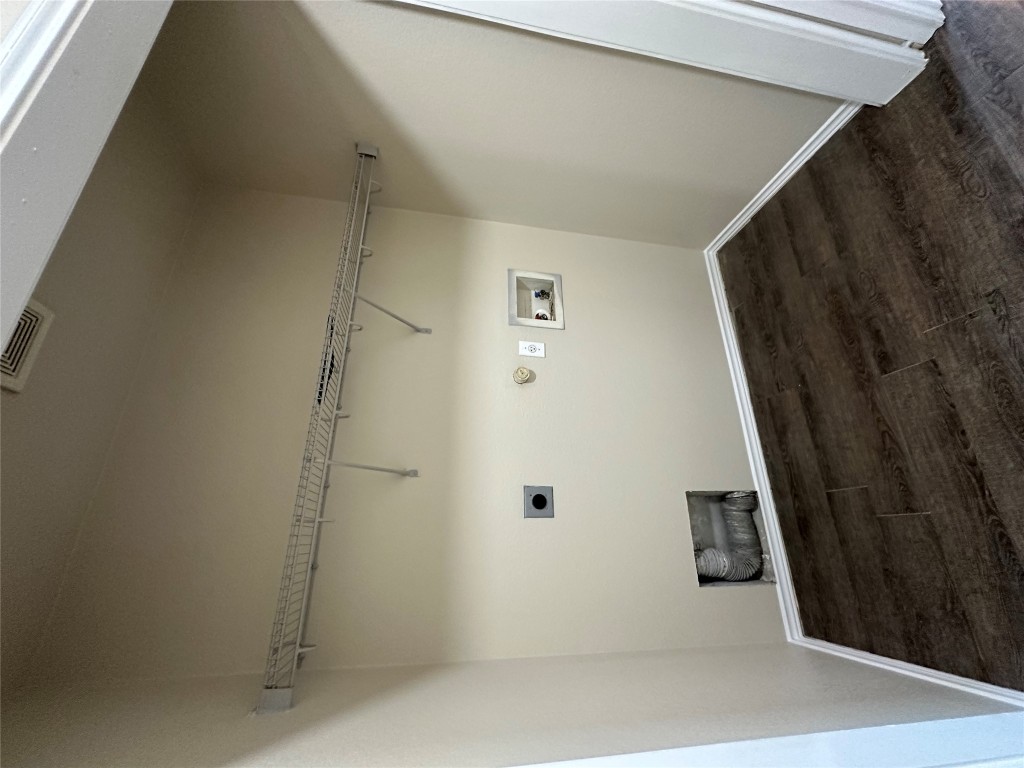 3416 Autumn Bay Drive Austin, TX 78744 - Photo 6 of 14 a view of a room with wooden floor