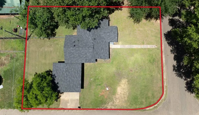 an aerial view of a residential houses