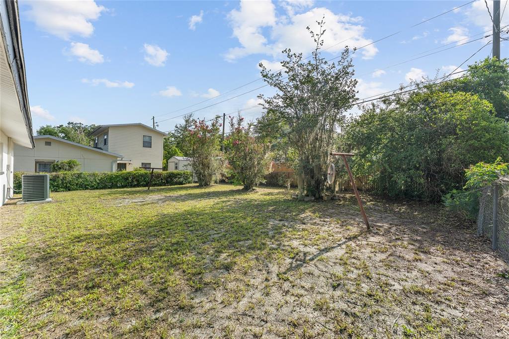 919 Southeast 19th Street Gainesville, FL 32641 - Photo 34 of 50 a view of a house with a yard