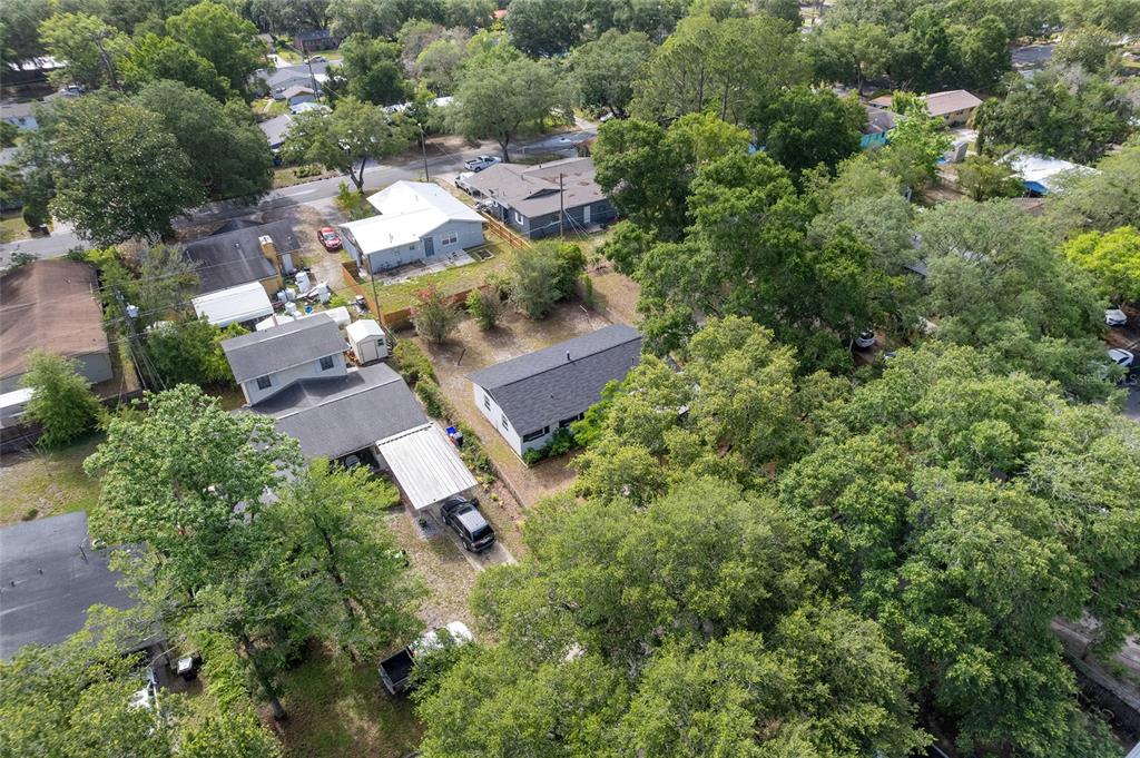 919 Southeast 19th Street Gainesville, FL 32641 - Photo 41 of 50 an aerial view of residential house with outdoor space and trees all around