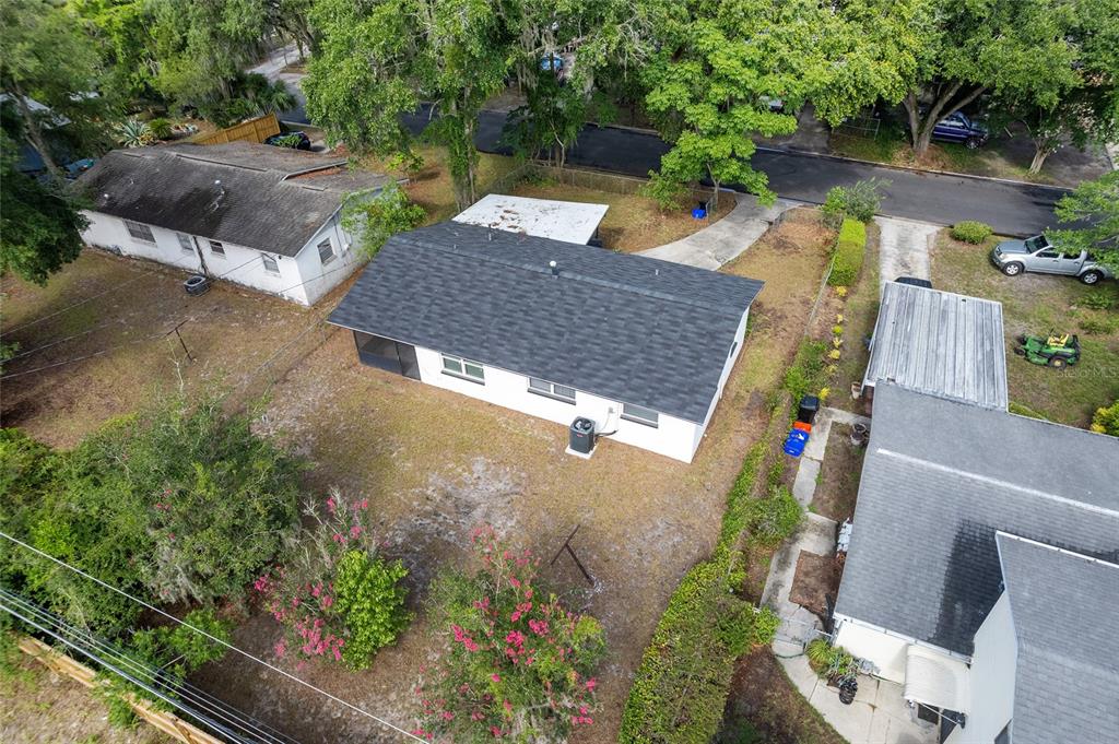 919 Southeast 19th Street Gainesville, FL 32641 - Photo 50 of 50 an aerial view of a house with outdoor space and lake view