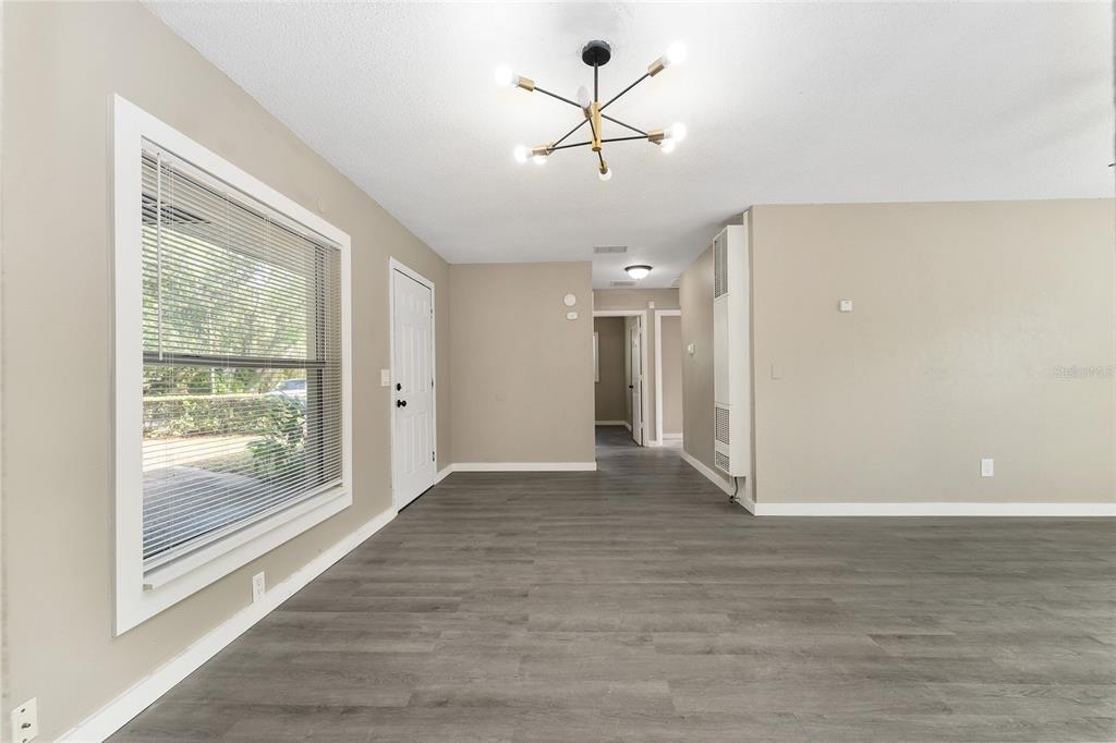 919 Southeast 19th Street Gainesville, FL 32641 - Photo 9 of 50 a view of an empty room with a window