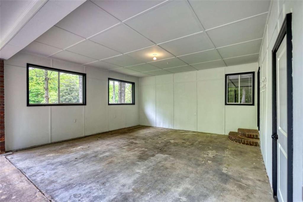 555 Joy Street Jackson, GA 30233 - Photo 48 of 56 a view of an empty room and a window