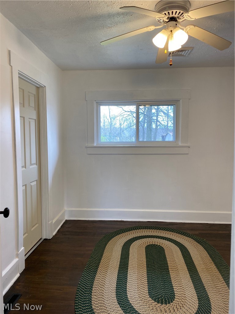 6595 Waterloo Road Atwater, OH 44201 - Photo 14 of 28 Bedroom 3 next to bathroom with refinished hardwoods.
