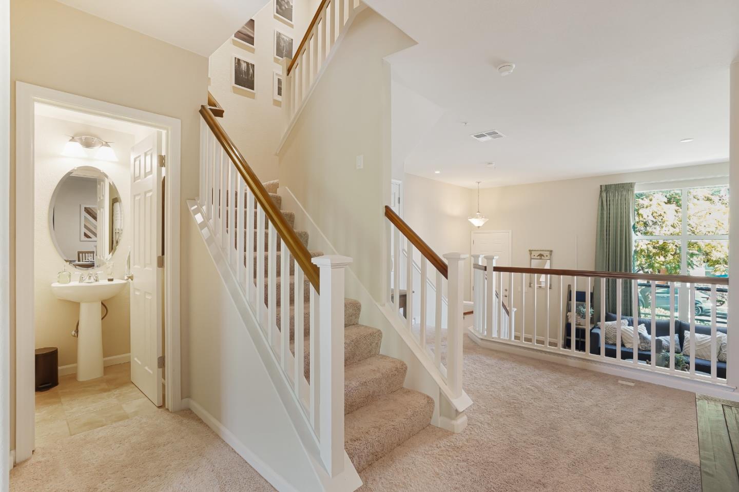 109 Esfahan Drive San Jose, CA 95111 - Photo 14 of 44 a view of a hallway with windows and stairs