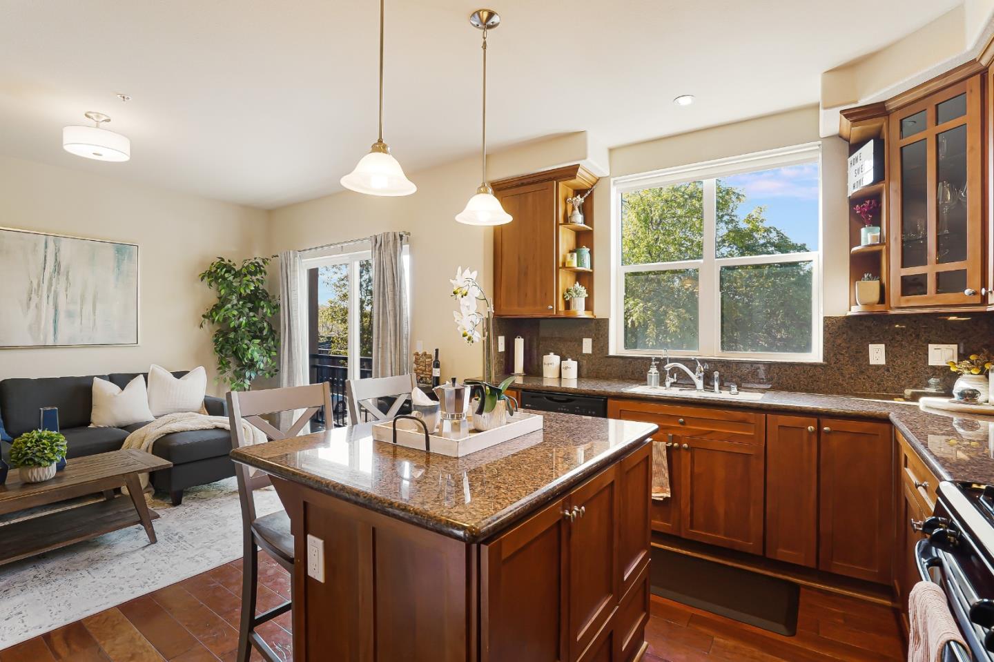 109 Esfahan Drive San Jose, CA 95111 - Photo 21 of 44 a kitchen with stainless steel appliances granite countertop a sink and a large window