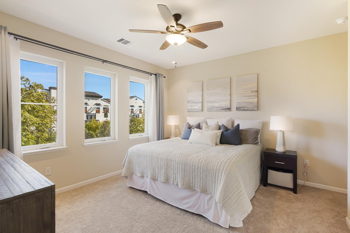 109 Esfahan Drive San Jose, CA 95111 - Photo 24 of 44 a bedroom with a large bed and a chandelier fan