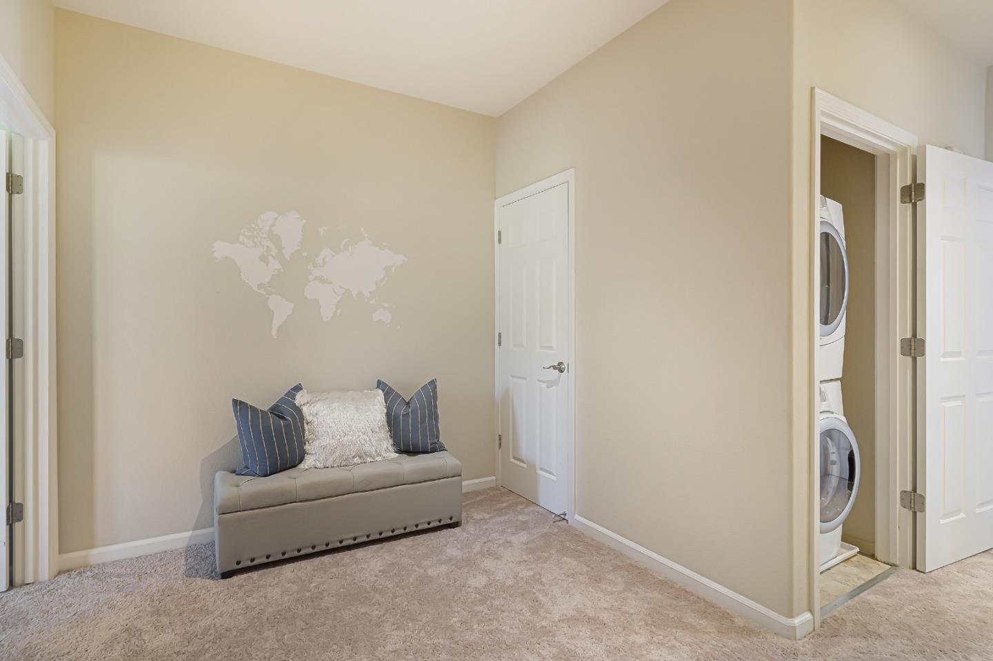 109 Esfahan Drive San Jose, CA 95111 - Photo 37 of 44 a living room with furniture and a walk in closet with wooden floor