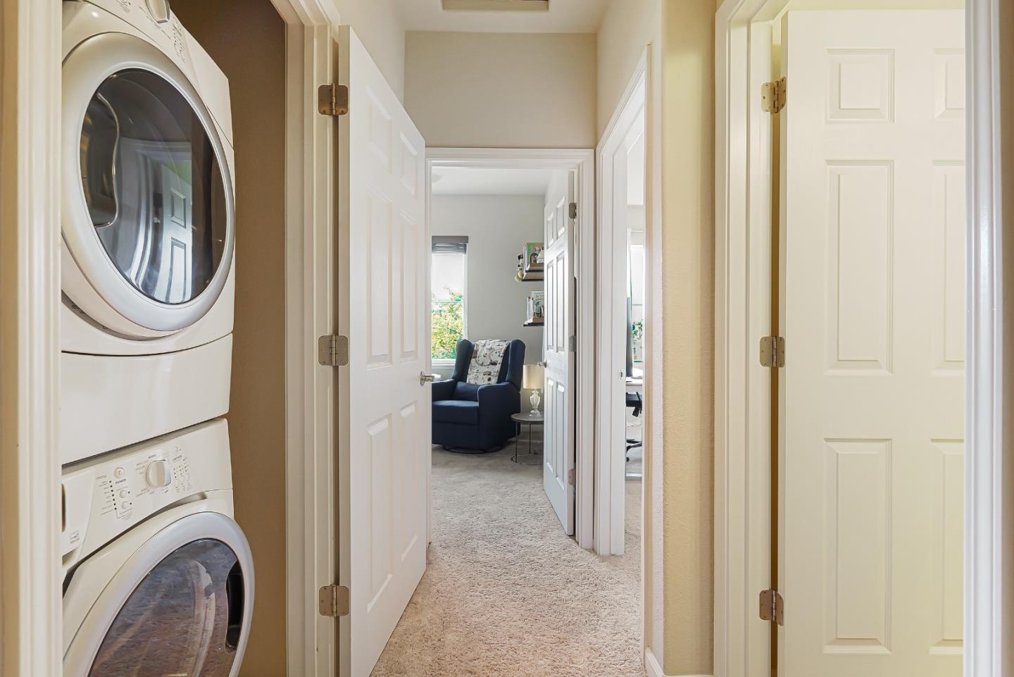 109 Esfahan Drive San Jose, CA 95111 - Photo 38 of 44 a view of a hallway with washer and dryer