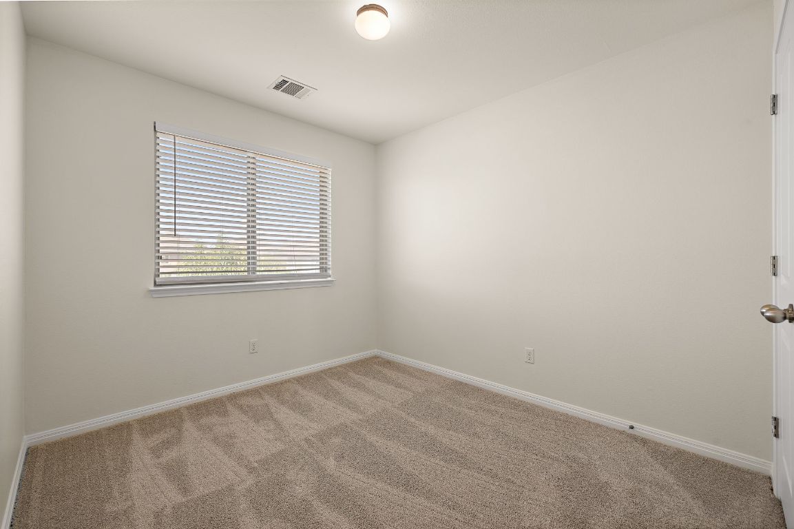 4602 Kind Way, Unit 287 Austin, TX 78725 - Photo 18 of 25 an empty room with a window