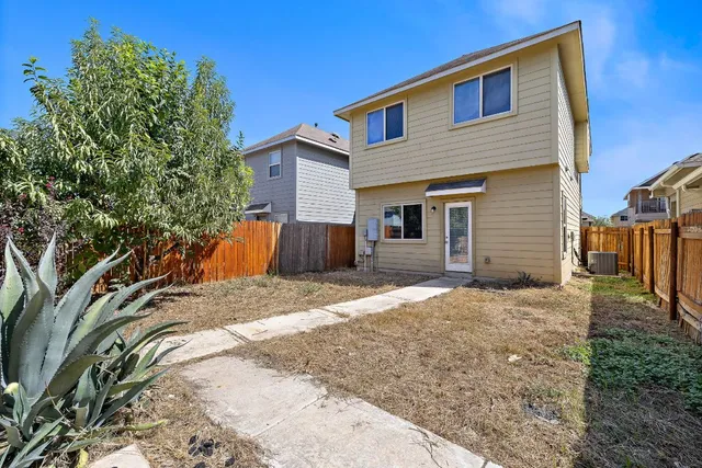 a view of a house with a patio