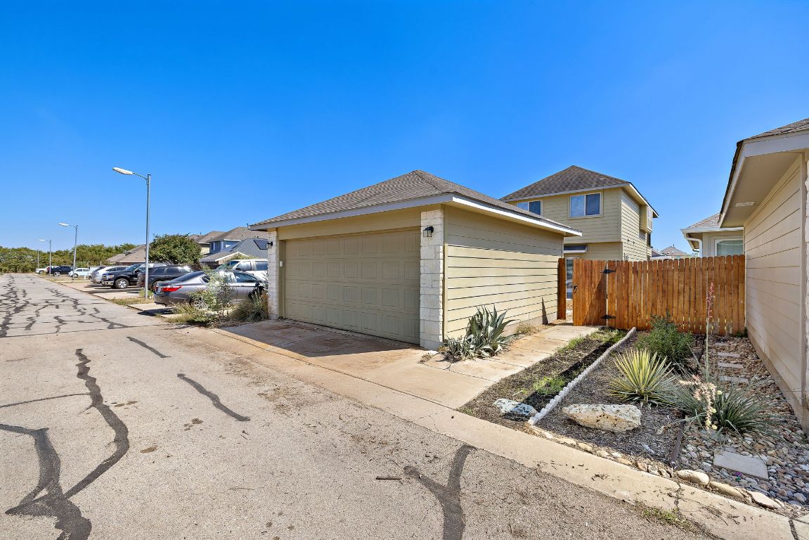 4602 Kind Way, Unit 287 Austin, TX 78725 - Photo 22 of 25 a view of a house with a patio