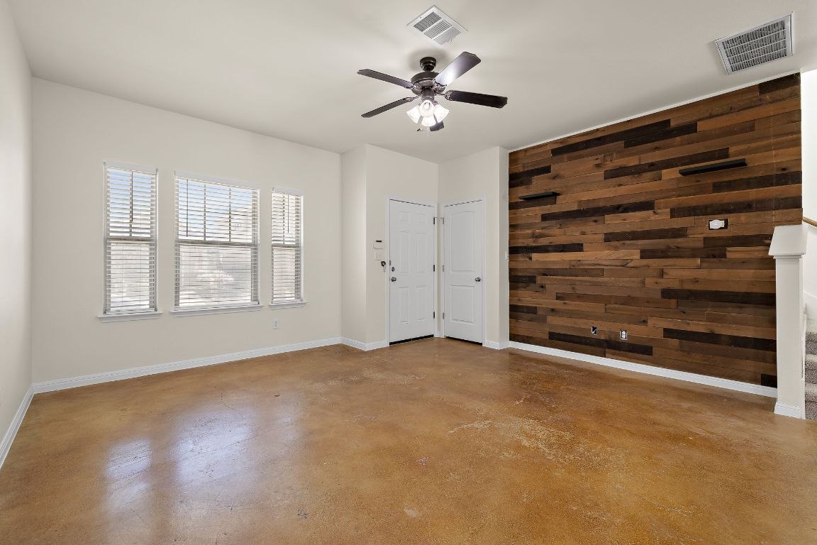 4602 Kind Way, Unit 287 Austin, TX 78725 - Photo 4 of 25 a view of an empty room with a window