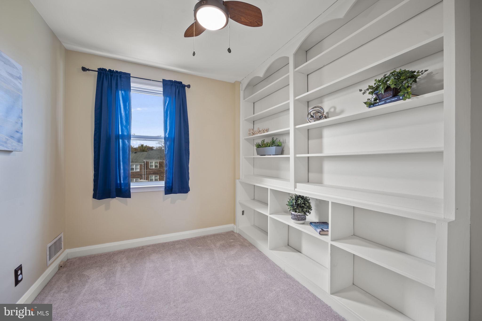 36 Darrow Drive Baltimore, MD 21228 - Photo 24 of 42 a view of an empty room with a window and shelf