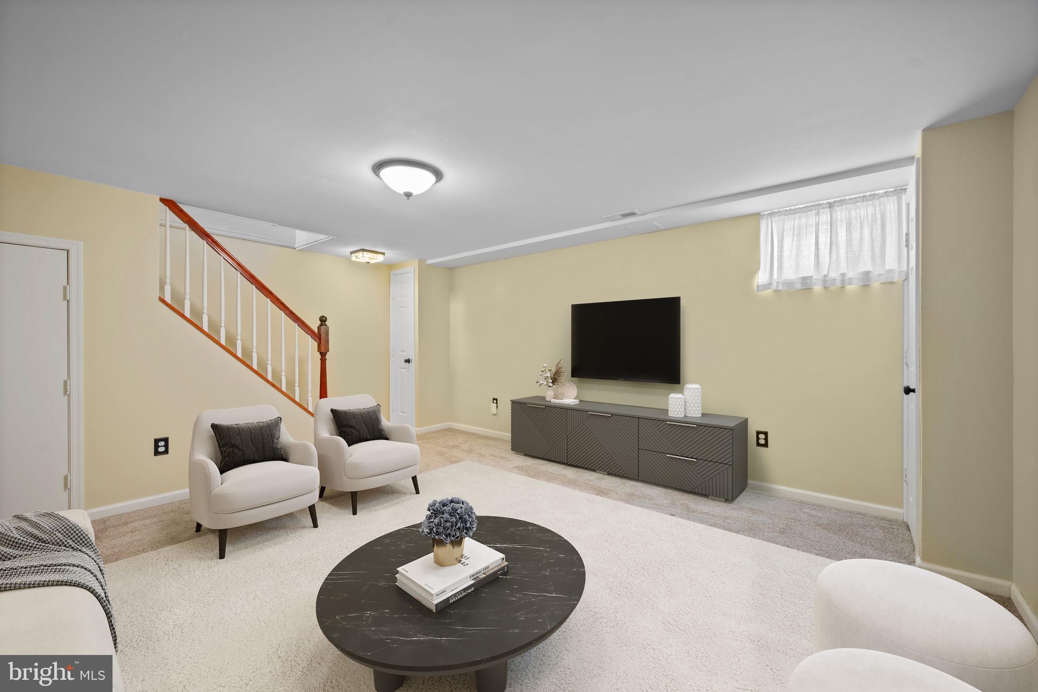 36 Darrow Drive Baltimore, MD 21228 - Photo 29 of 42 a living room with furniture and a flat screen tv