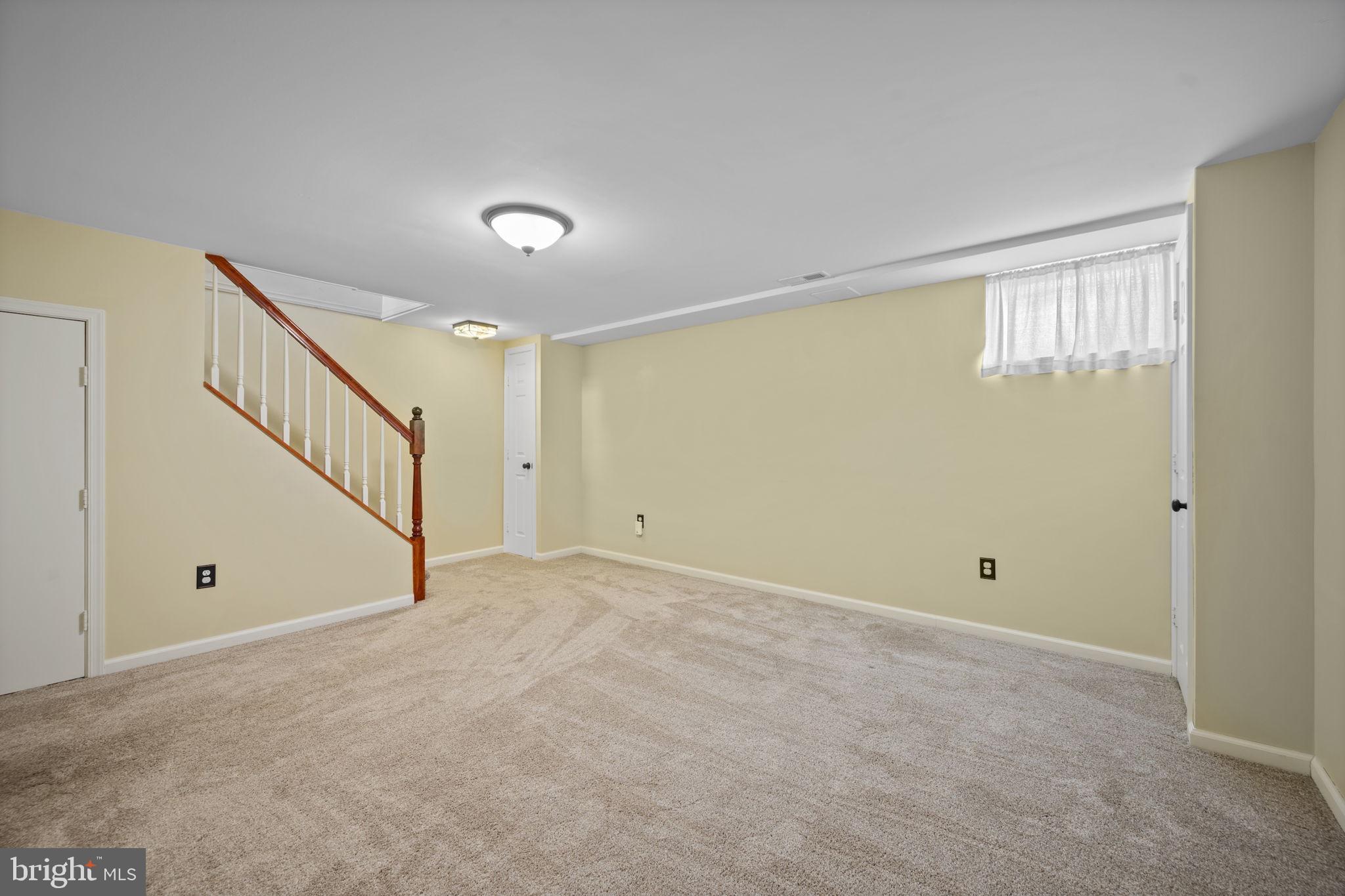 36 Darrow Drive Baltimore, MD 21228 - Photo 30 of 42 a view of an empty room with a window