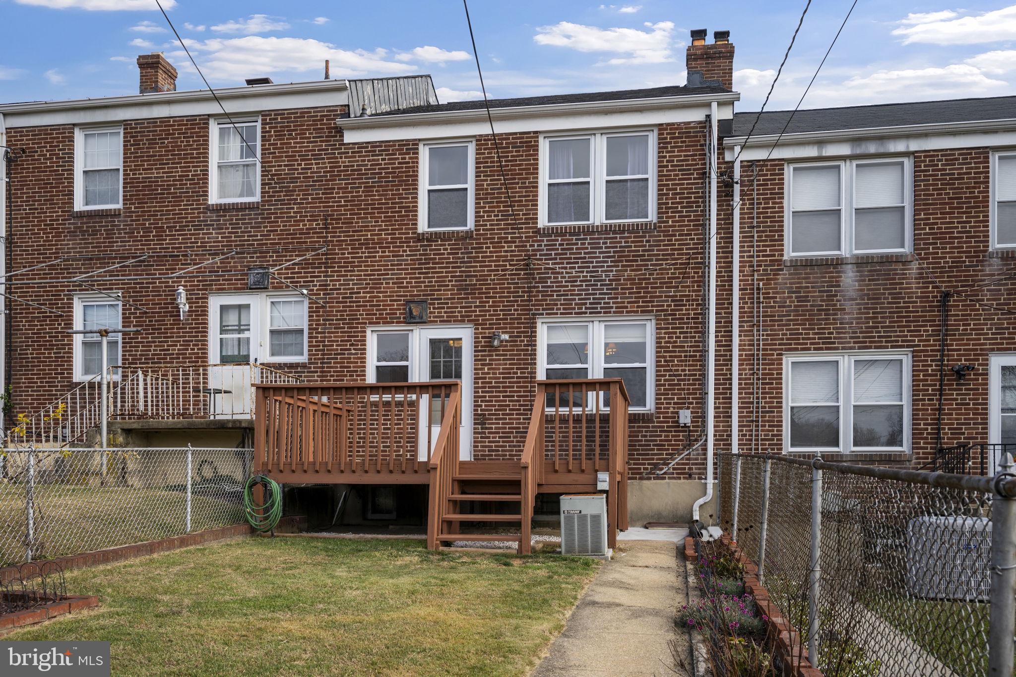 36 Darrow Drive Baltimore, MD 21228 - Photo 34 of 42 a front view of a house with a yard