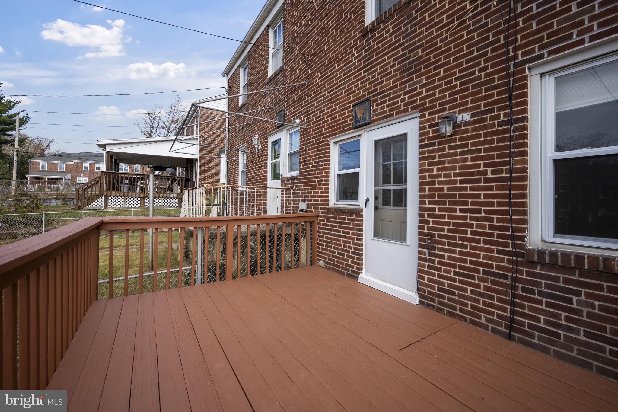 36 Darrow Drive Baltimore, MD 21228 - Photo 36 of 42 a balcony with a bench