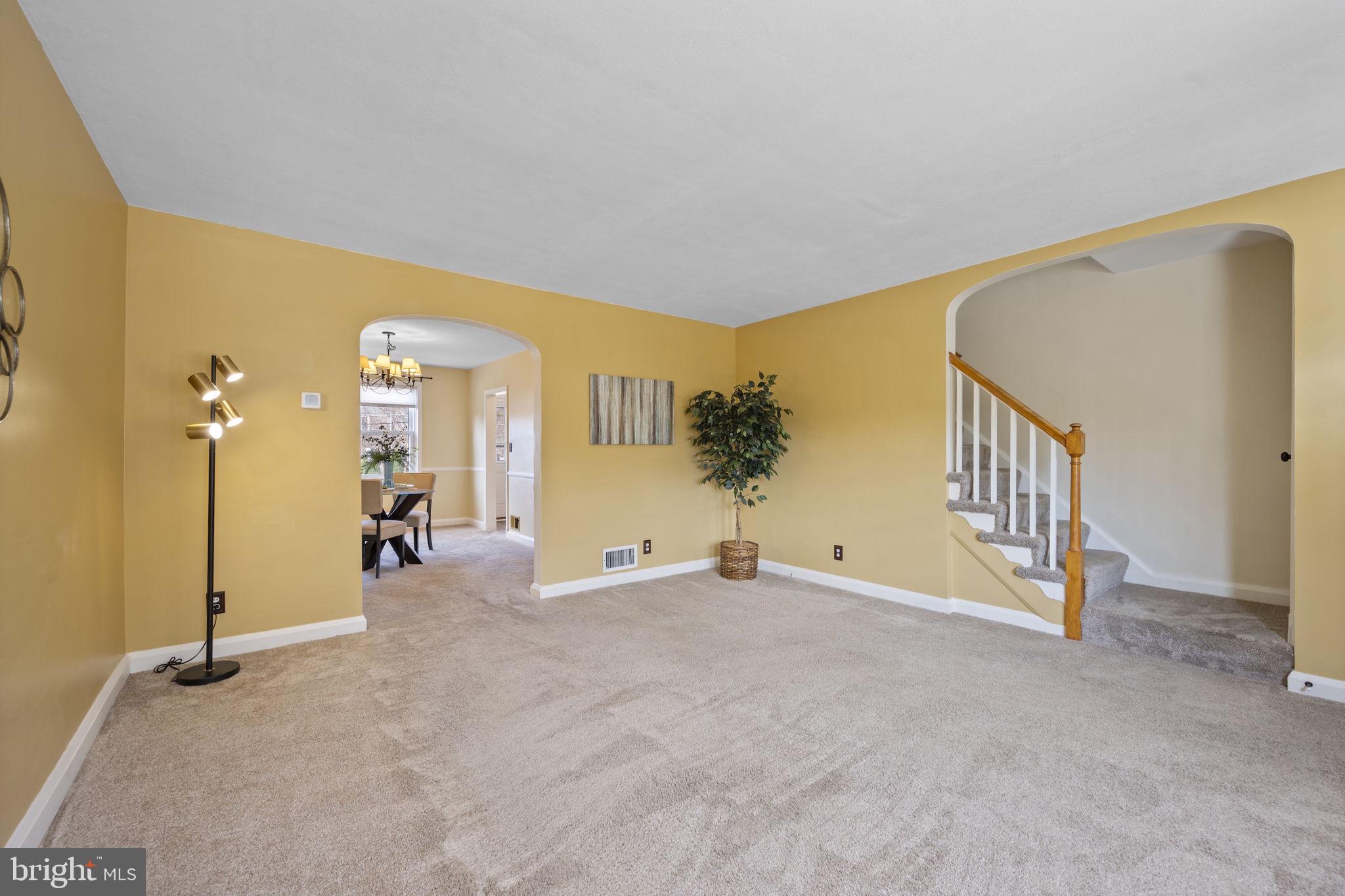 36 Darrow Drive Baltimore, MD 21228 - Photo 5 of 42 an empty room with windows