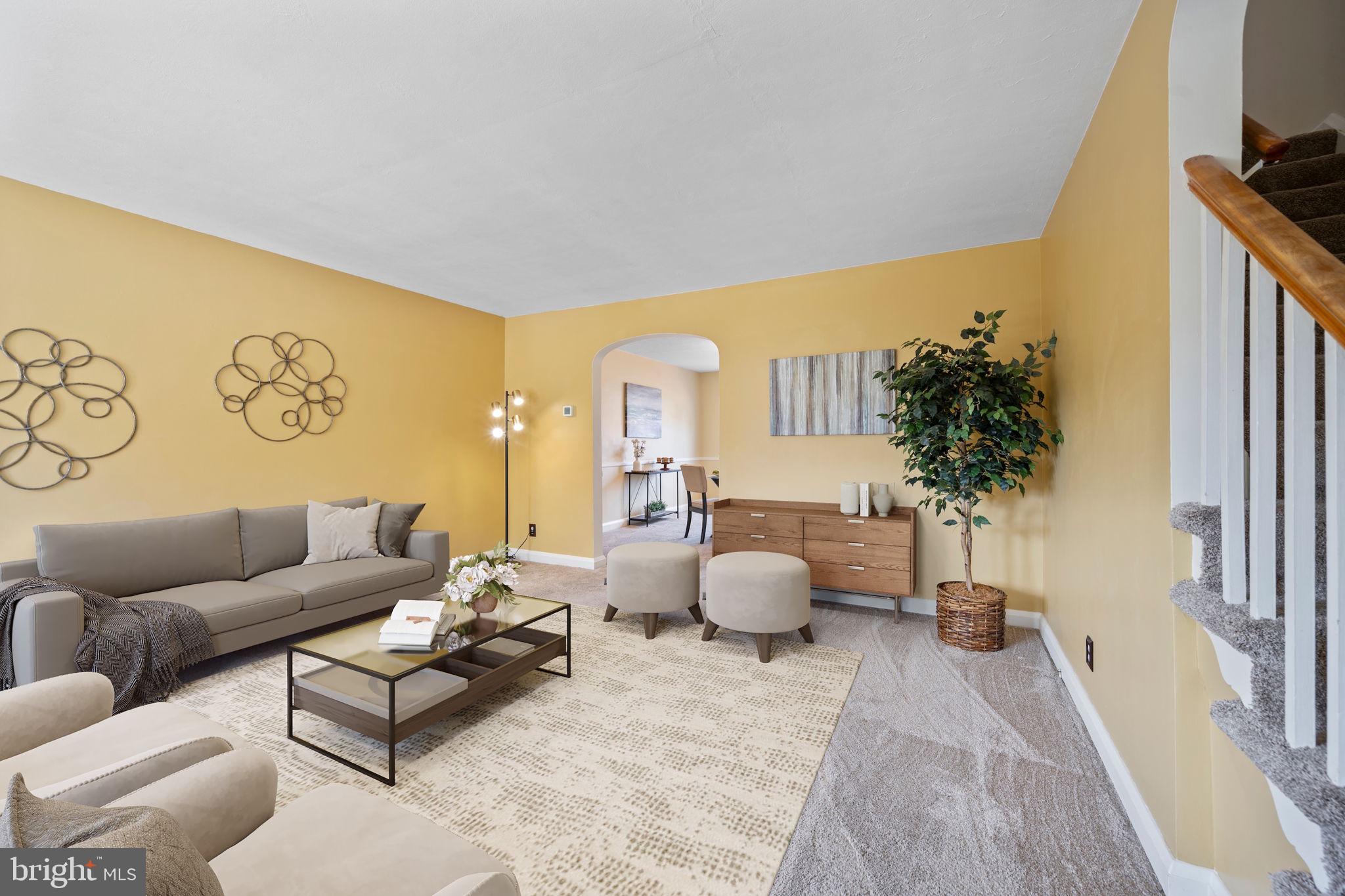36 Darrow Drive Baltimore, MD 21228 - Photo 6 of 42 a living room with furniture and a potted plant