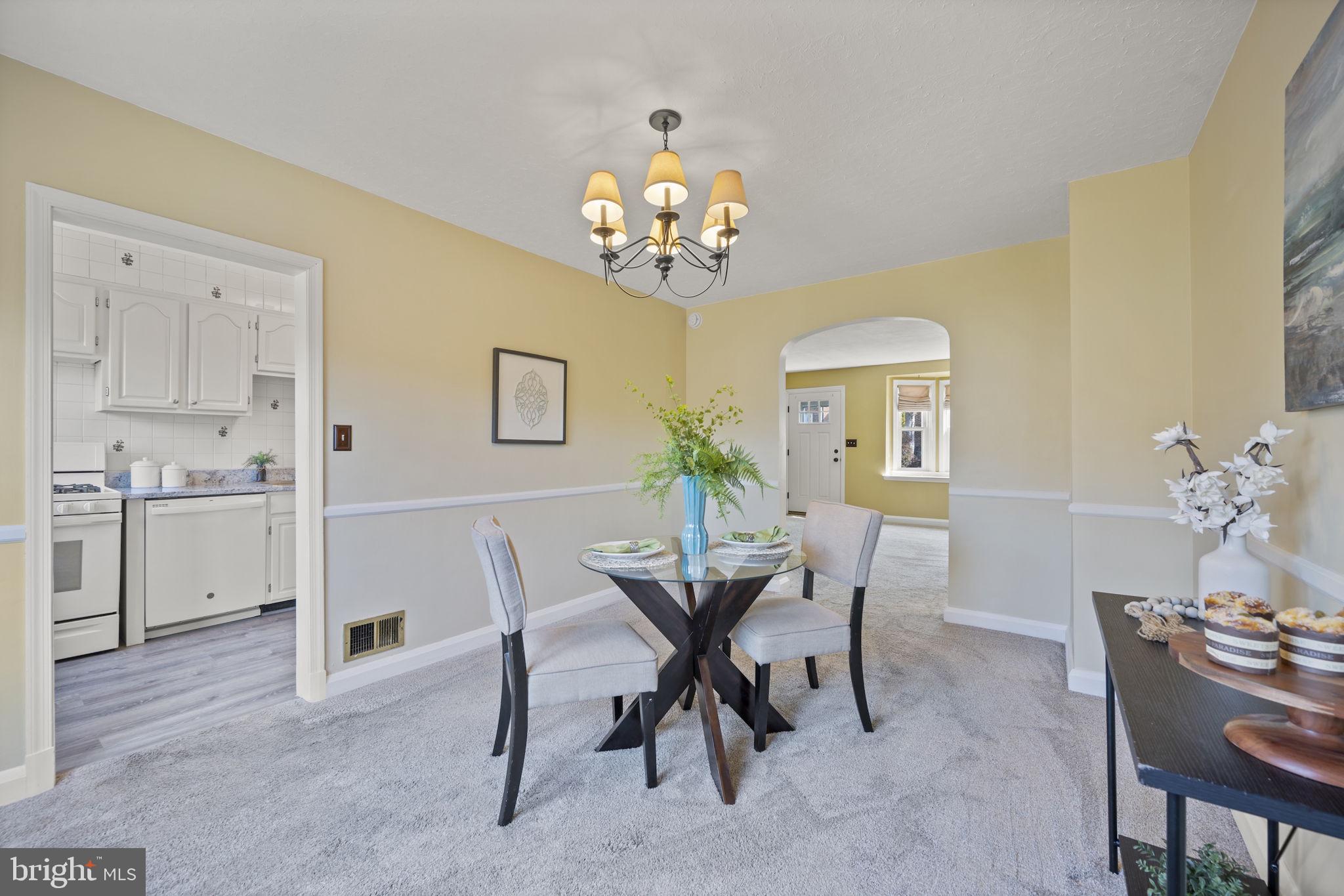 36 Darrow Drive Baltimore, MD 21228 - Photo 8 of 42 a view of a dining room with furniture and chandelier