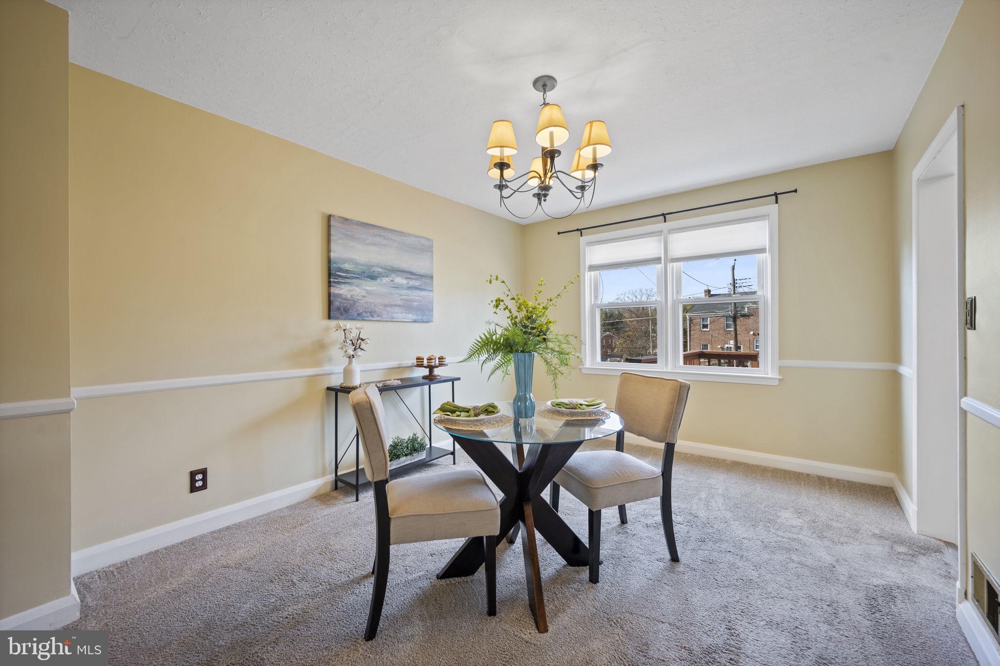36 Darrow Drive Baltimore, MD 21228 - Photo 9 of 42 a view of a dining room with furniture and window