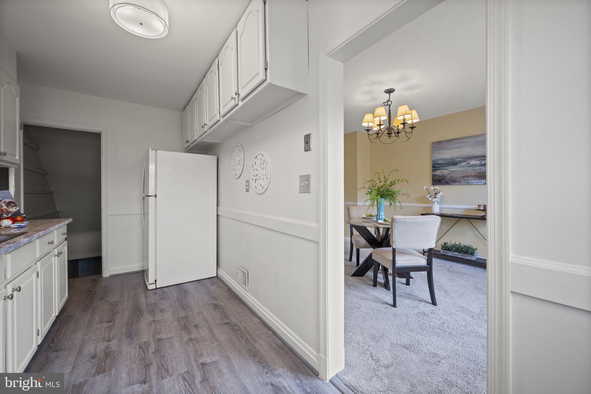 36 Darrow Drive Baltimore, MD 21228 - Photo 10 of 42 a view of a dining room with furniture and wooden floor