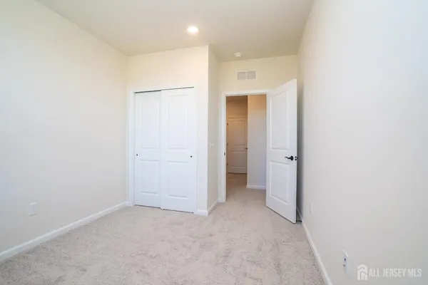an empty room with closet