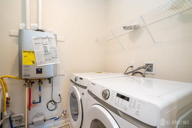 a utility room with dryer and washer