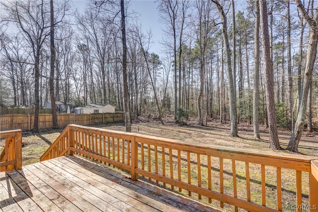 412 Queensway Road Chesterfield, VA 23236 - Photo 16 of 39 a view of balcony with wooden floor and fence