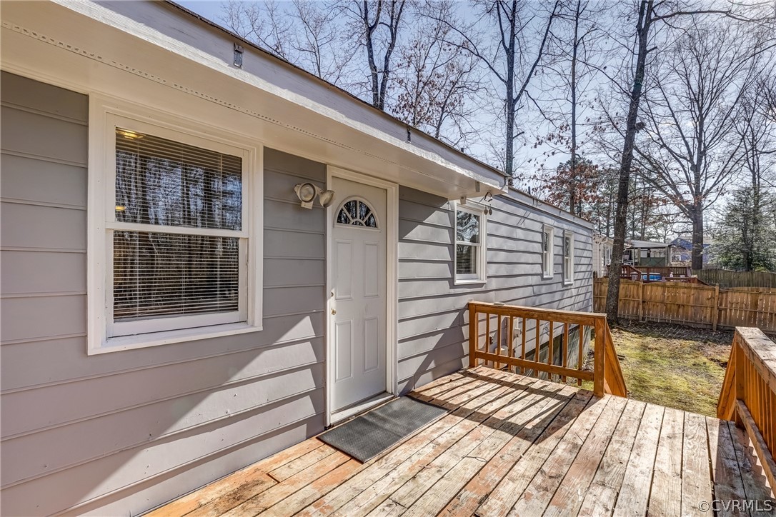 412 Queensway Road Chesterfield, VA 23236 - Photo 17 of 39 a view of a wooden deck with a bench