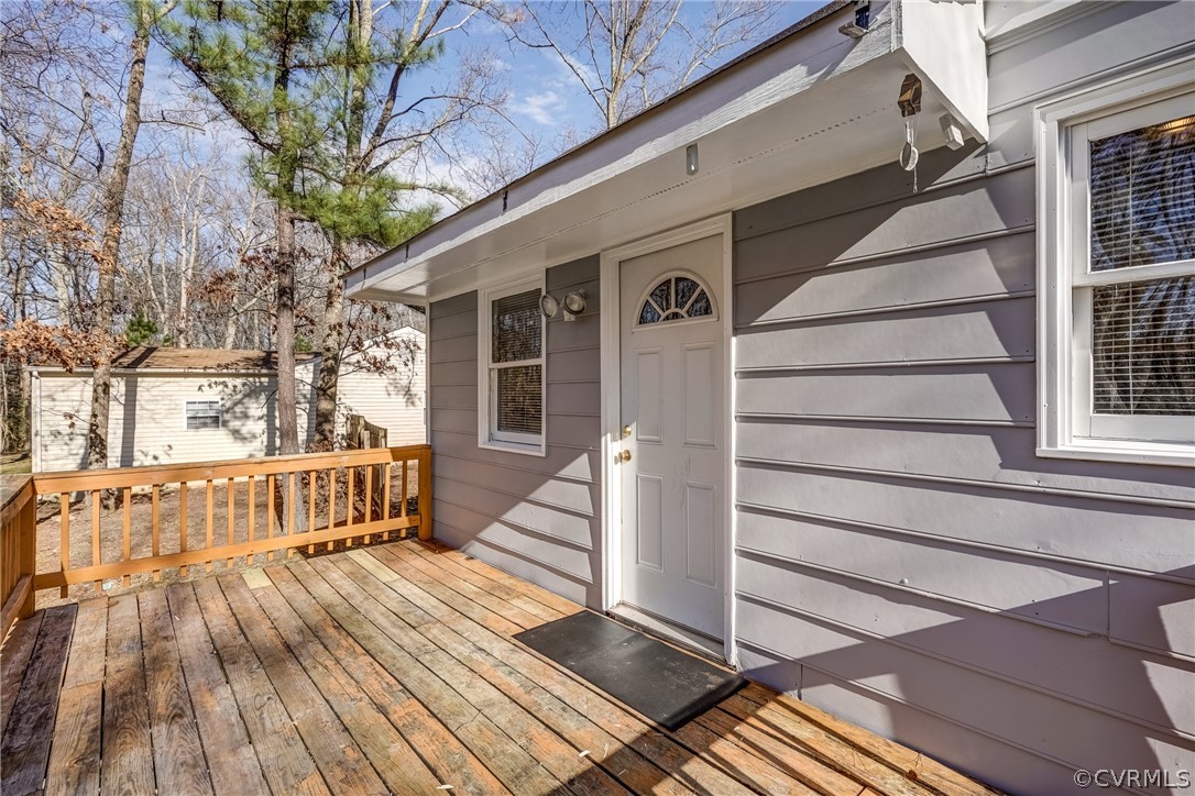 412 Queensway Road Chesterfield, VA 23236 - Photo 18 of 39 a view of outdoor space with deck and furniture