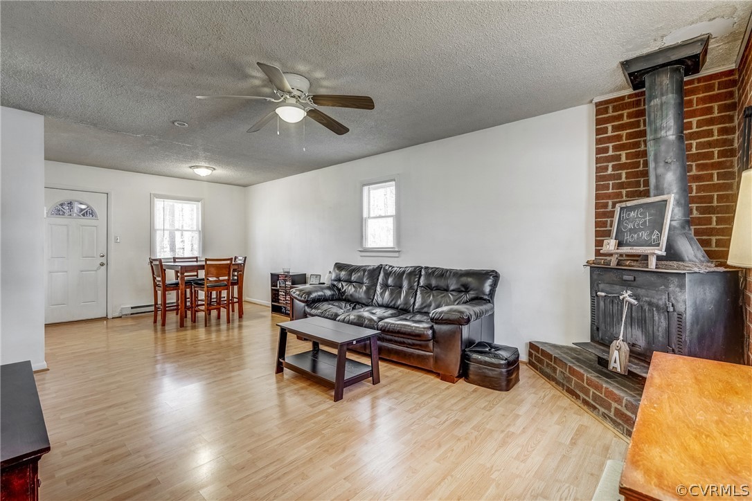 412 Queensway Road Chesterfield, VA 23236 - Photo 22 of 39 a living room with furniture and wooden floor
