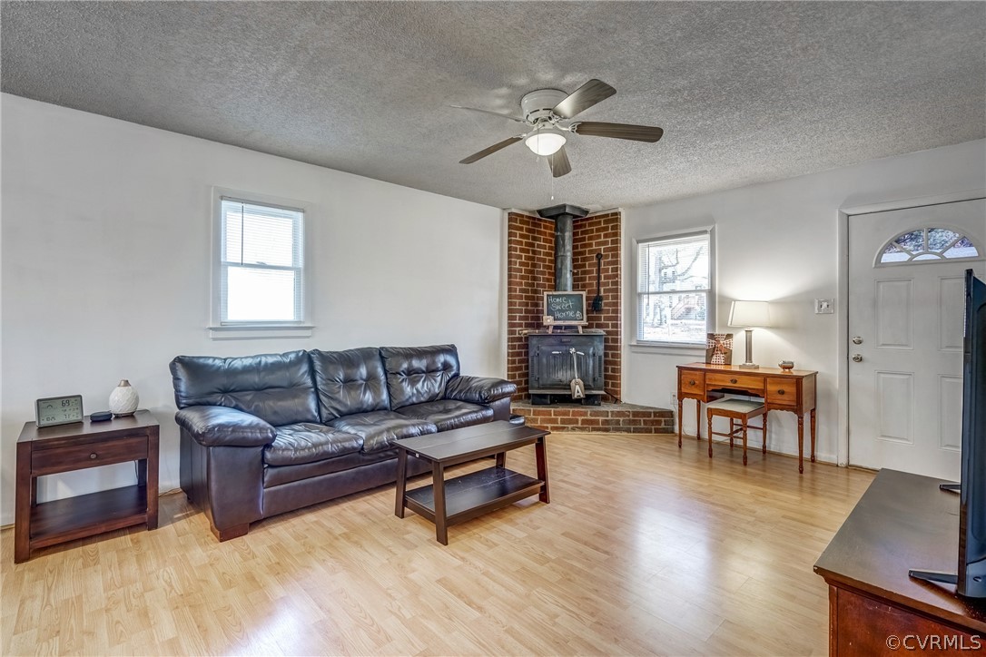 412 Queensway Road Chesterfield, VA 23236 - Photo 23 of 39 a living room with furniture and a wooden floor