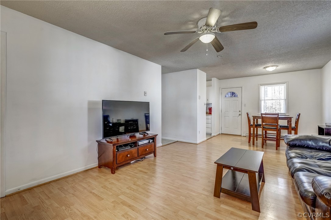 412 Queensway Road Chesterfield, VA 23236 - Photo 25 of 39 a living room with furniture and a fireplace