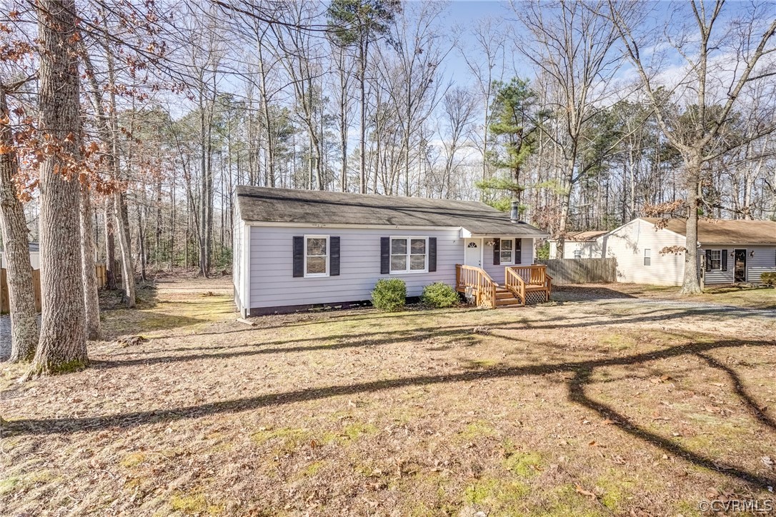 412 Queensway Road Chesterfield, VA 23236 - Photo 3 of 39 a view of a house with a yard covered with snow