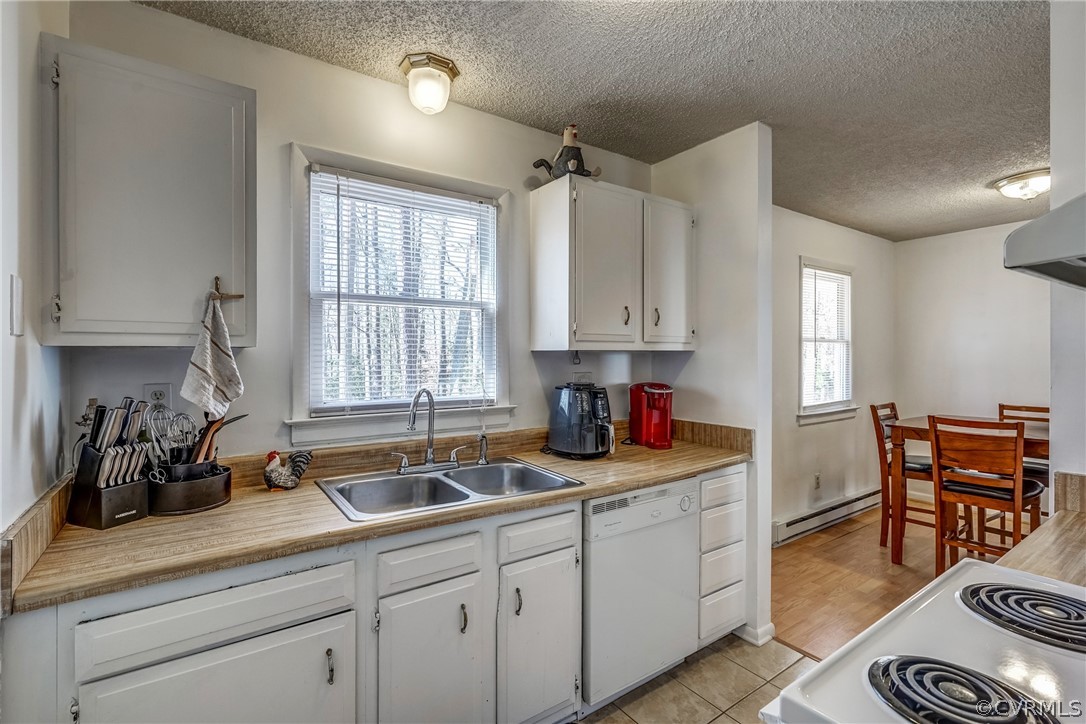 412 Queensway Road Chesterfield, VA 23236 - Photo 32 of 39 a kitchen with sink cabinets and window