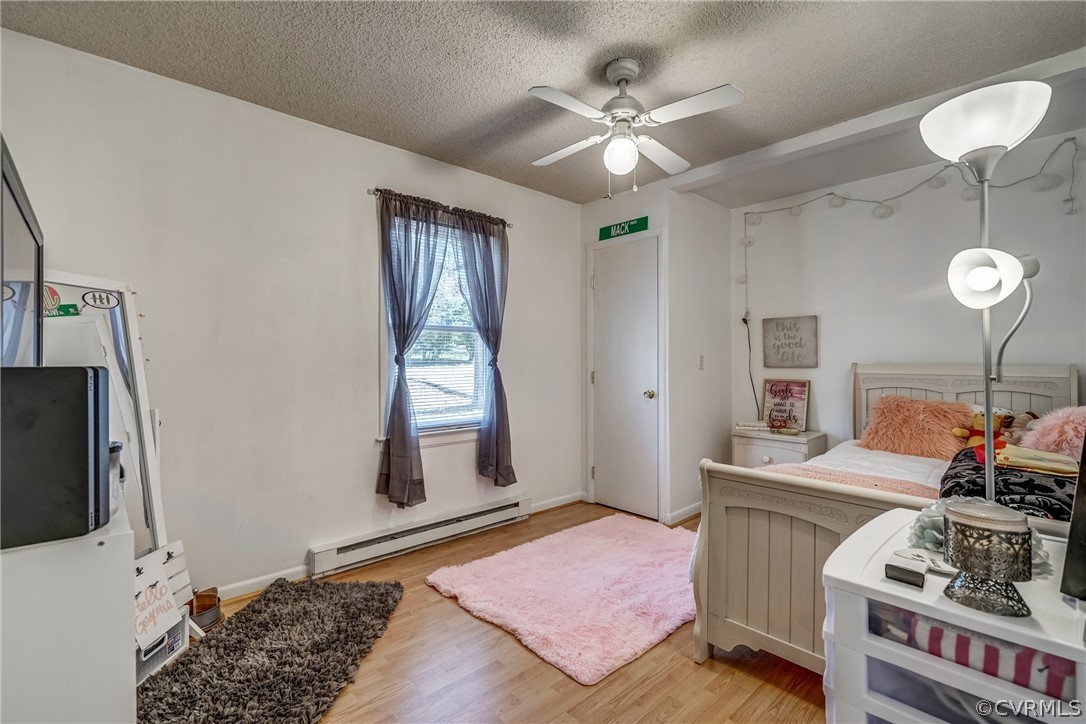 412 Queensway Road Chesterfield, VA 23236 - Photo 36 of 39 a bedroom with furniture and a window