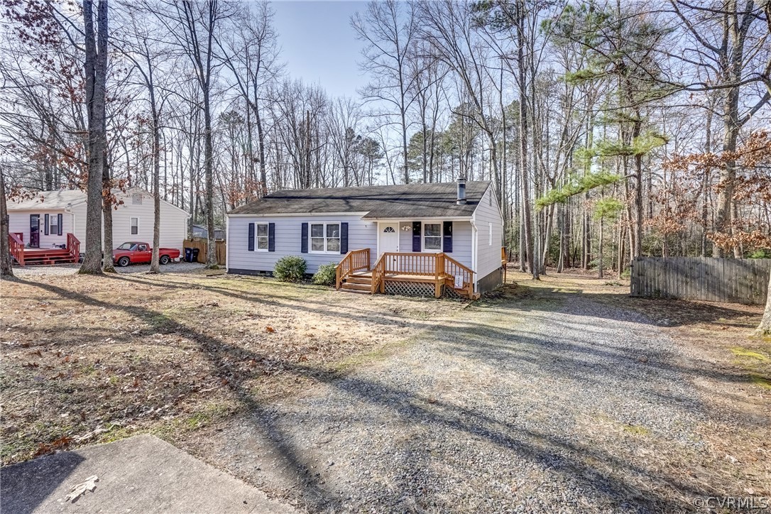 412 Queensway Road Chesterfield, VA 23236 - Photo 5 of 39 a front view of residential houses with yard and trees