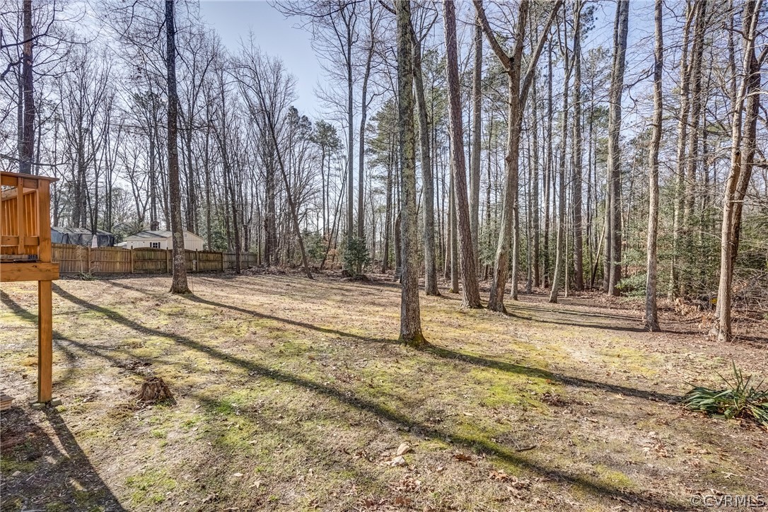 412 Queensway Road Chesterfield, VA 23236 - Photo 7 of 39 a view of a backyard with large trees